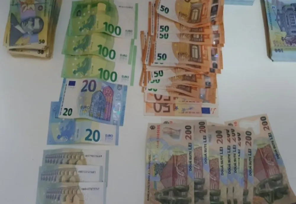 Poliţiştii au confiscat peste 99.000 de lei după 18 percheziţii în Ilfov şi Dâmboviţa  