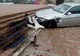 FOTO BMW făcut praf și abandonat pe scările de la Polivalentă