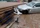 FOTO BMW făcut praf și abandonat pe scările de la Polivalentă